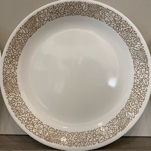 Set of three Corelle dinner plates with brown details.